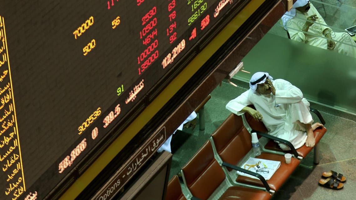 A Kuwaiti trader follows the stock market at the Kuwait Stock Exchange (KSE) in Kuwait City on September 29, 2016. (AFP)