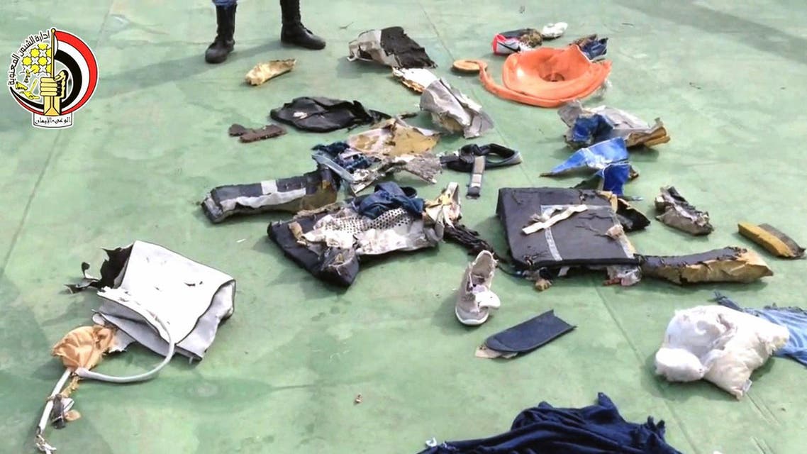An image grab taken from a video uploaded on the official Facebook page of the Egyptian military spokesperson on May 21, 2016 and taken from an undisclosed location reportedly shows some debris that the search teams found in the sea after the EgyptAir Airbus A320 crashed in the Mediterranean. (AFP)