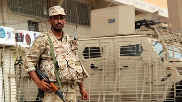 A Yemeni army soldier stands guard as he secures a street in Mansoura district of Yemen's southern port city of Aden March 30, 2016. The Yemeni army backed by local fighters seized control of parts of Aden held by al Qaeda on Wednesday as part of a push to clear the hardline group from its stronghold in the southern port city, a security official said. REUTERS