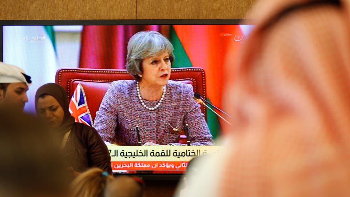 British Prime Minister Theresa May speaks as journalists take notes during the first Gulf Cooporative Council's (GCC) " GCC British Summit", in Sakhir Palace Bahrain, December 7, 2016. (Reuters)