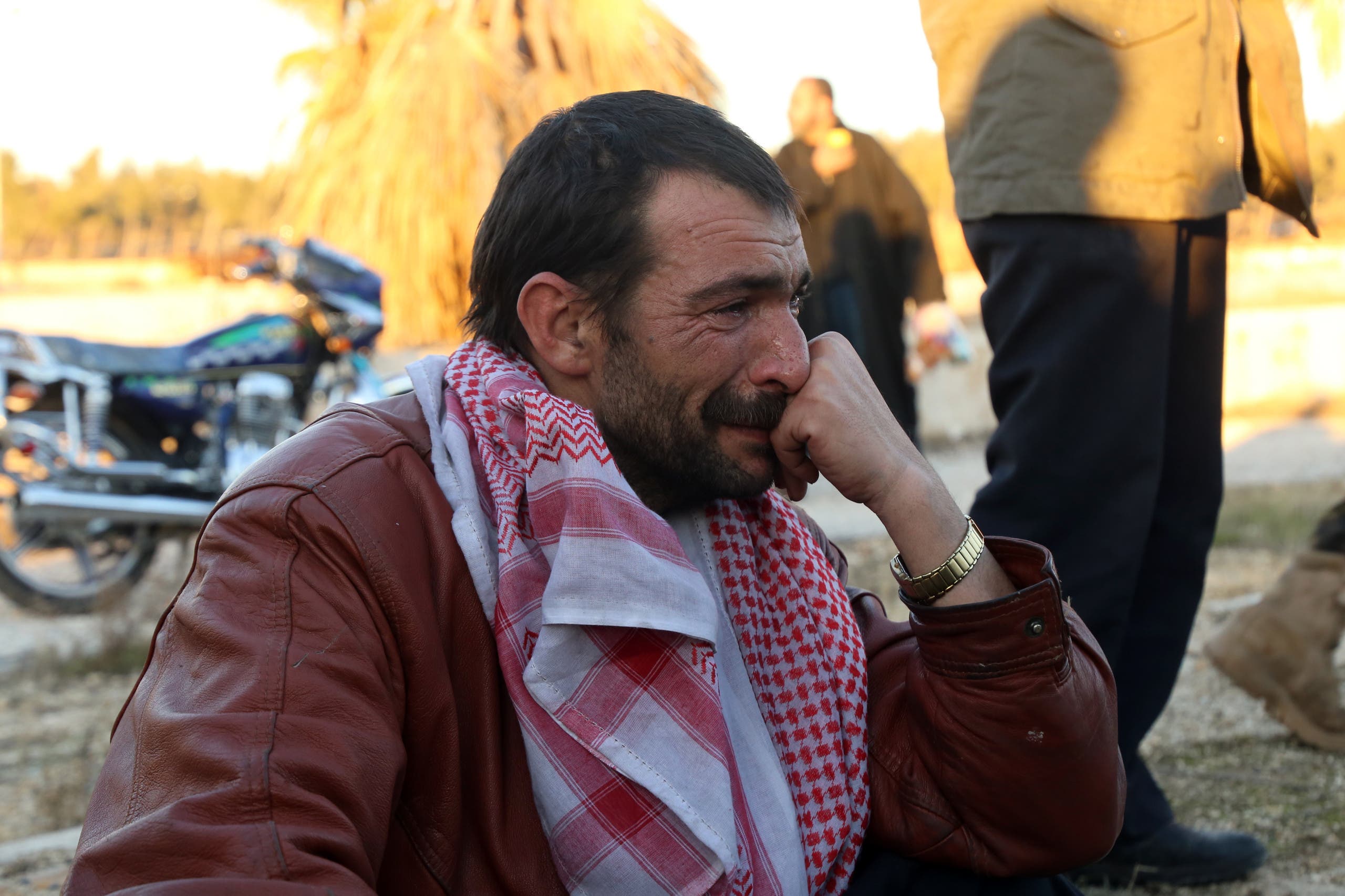A Syrian man, who was evacuated from rebel-held neighbourhoods in the embattled city of Aleppo, cries upon his arrival in the opposition-controlled Khan al-Aassal region, west of the city, on December 15, 2016, the first stop on their trip, where humanitarian groups will transport the civilians to temporary camps on the outskirts of Idlib and the wounded to field hospitals. Hundreds of civilians and rebels left Aleppo under an evacuation deal that will allow Syria's regime to take full control of the city after years of fighting. Baraa Al-Halabi / AFP