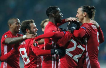 Manchester United's from left, Eric Bailly, Juan Mata, Paul Pogba, Henrikh Mkhitaryan and Zlatan Ibrahimovic celebrate after their first goal during the Europa League group A soccer match between Manchester United and Zorya Luhansk at Chornomorets stadium in Odessa, Ukraine, Thursday, Dec. 8, 2016. (AP Photo/Efrem Lukatsky)