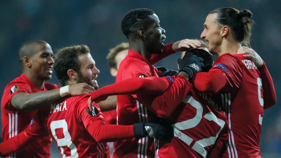 Manchester United's from left, Eric Bailly, Juan Mata, Paul Pogba, Henrikh Mkhitaryan and Zlatan Ibrahimovic celebrate after their first goal during the Europa League group A soccer match between Manchester United and Zorya Luhansk at Chornomorets stadium in Odessa, Ukraine, Thursday, Dec. 8, 2016. (AP Photo/Efrem Lukatsky)