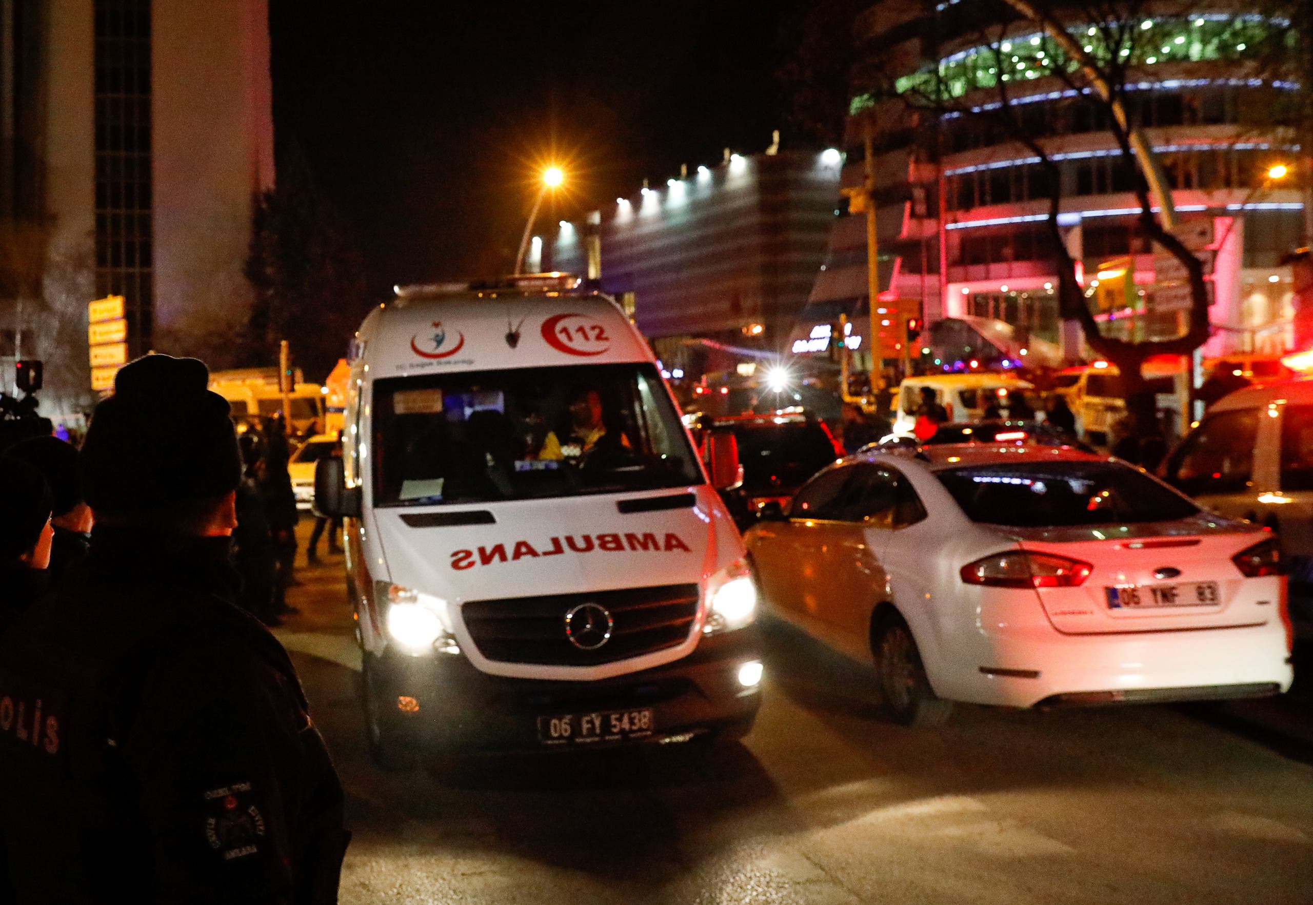 An ambulance leaves the area near an art gallery where the Russian Ambassador to Turkey Andrei Karlov was shot in Ankara, Turkey, December 19, 2016. (Reuters)