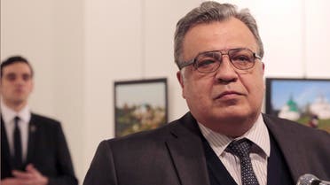 Andrei Karlov, the Russian Ambassador to Turkey, speaks at a photo exhibition in Ankara on Monday, Dec. 19, 2016, moments before a gunman opened fire on him. (AP)
