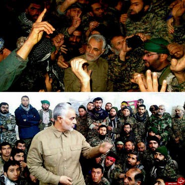 قائد فيلق القدس فيالحرس الثوري قاسم سليماني مع ميليشيات إيرانية في حلب(|أرشيفية)