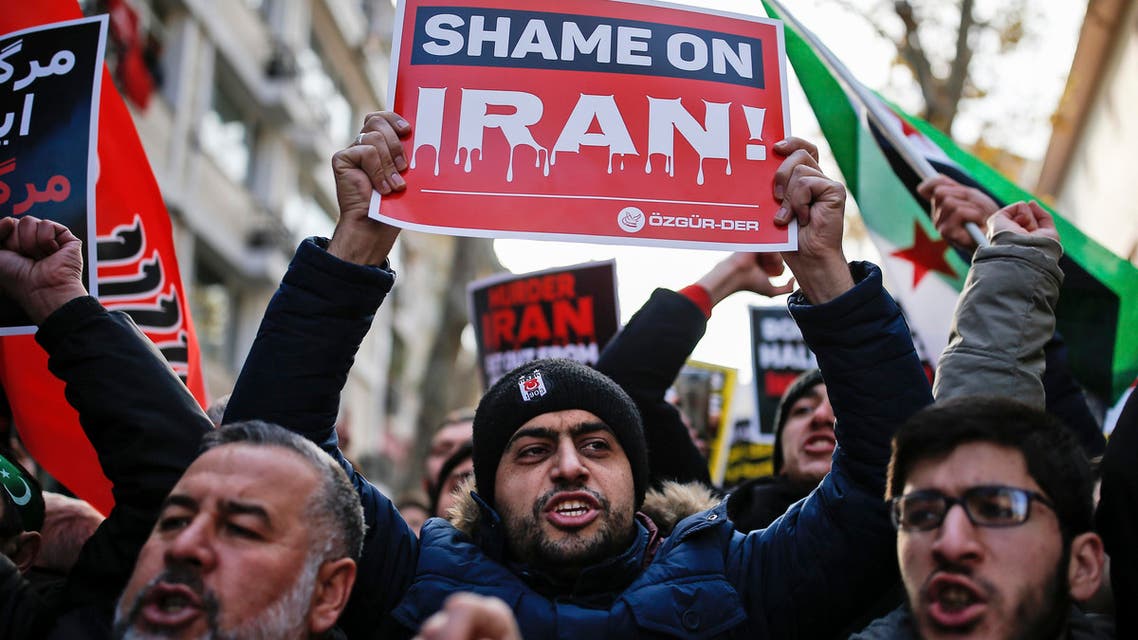 Members of a pro-Islamic group chant slogans and hold anti-Iran placards during a demonstration against the war in Aleppo, Syria, and what they call Iran's involvement in the conflict, close to Iran's consulate in Istanbul, Friday, Dec, 16, 2016. (AP)