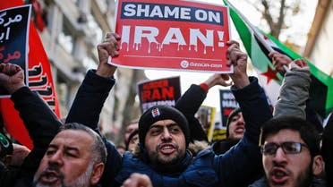 Members of a pro-Islamic group chant slogans and hold anti-Iran placards during a demonstration against the war in Aleppo, Syria, and what they call Iran's involvement in the conflict, close to Iran's consulate in Istanbul, Friday, Dec, 16, 2016. (AP)