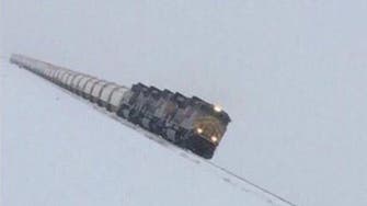 Believe it or not: A train ploughs through a Saudi snowstorm