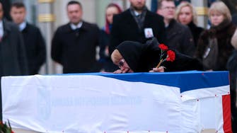 Murdered envoy’s family weep over coffin in Moscow