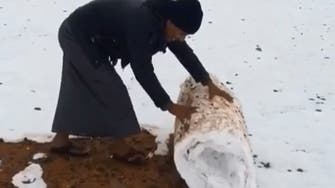VIDEO: Saudi man seen rolling snow into a carpet