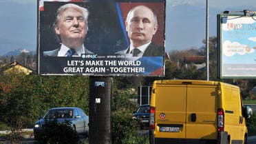 Cars pass by a billboard showing US President-elect Donald Trump and Russian President Vladimir Putin placed by pro-Serbian movement in the town of Danilovgrad on November 16, 2016. (AFP)