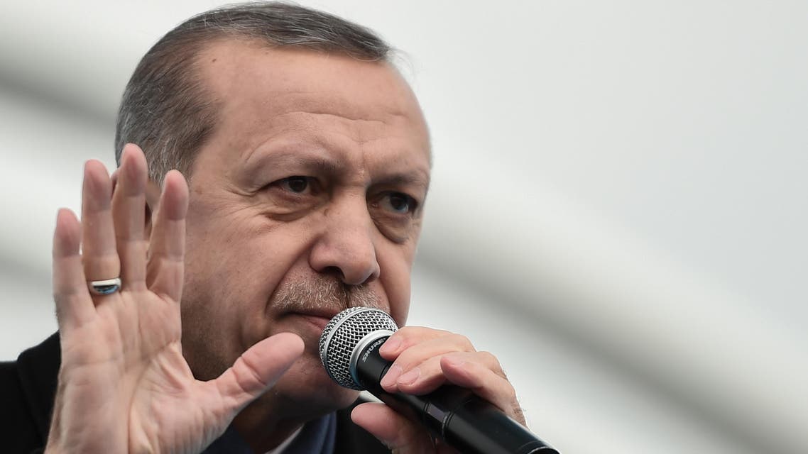 Turkish President Recep Tayyip Erdogan gestures as he delivers a speech on December 20, 2016 in Istanbul, during the opening cerenomy of the Avrasya (Eurasia) Tunnel, the first ever road tunnel underneath the Bosphorus Strait in Istanbul from Europe to Asia and the latest project in the Erdogan's plan of transforming Turkey's infrastructure. Turkey in October 2013 opened the Marmaray rail tunnel underneath the iconic waterway, the first link beneath the waters that divide Europe and Asia. But the new Avrasya (Eurasia) Tunnel is the first tunnel for cars underneath the Bosphorus and aims to relieve congestion in the traffic-clogged Turkish megacity. Other schemes, which Erdogan boasts are his "crazy projects", include a gigantic third airport for Istanbul, the first ever bridge across the Dardanelles straits and even a Suez-style shipping canal for Istanbul. AFP