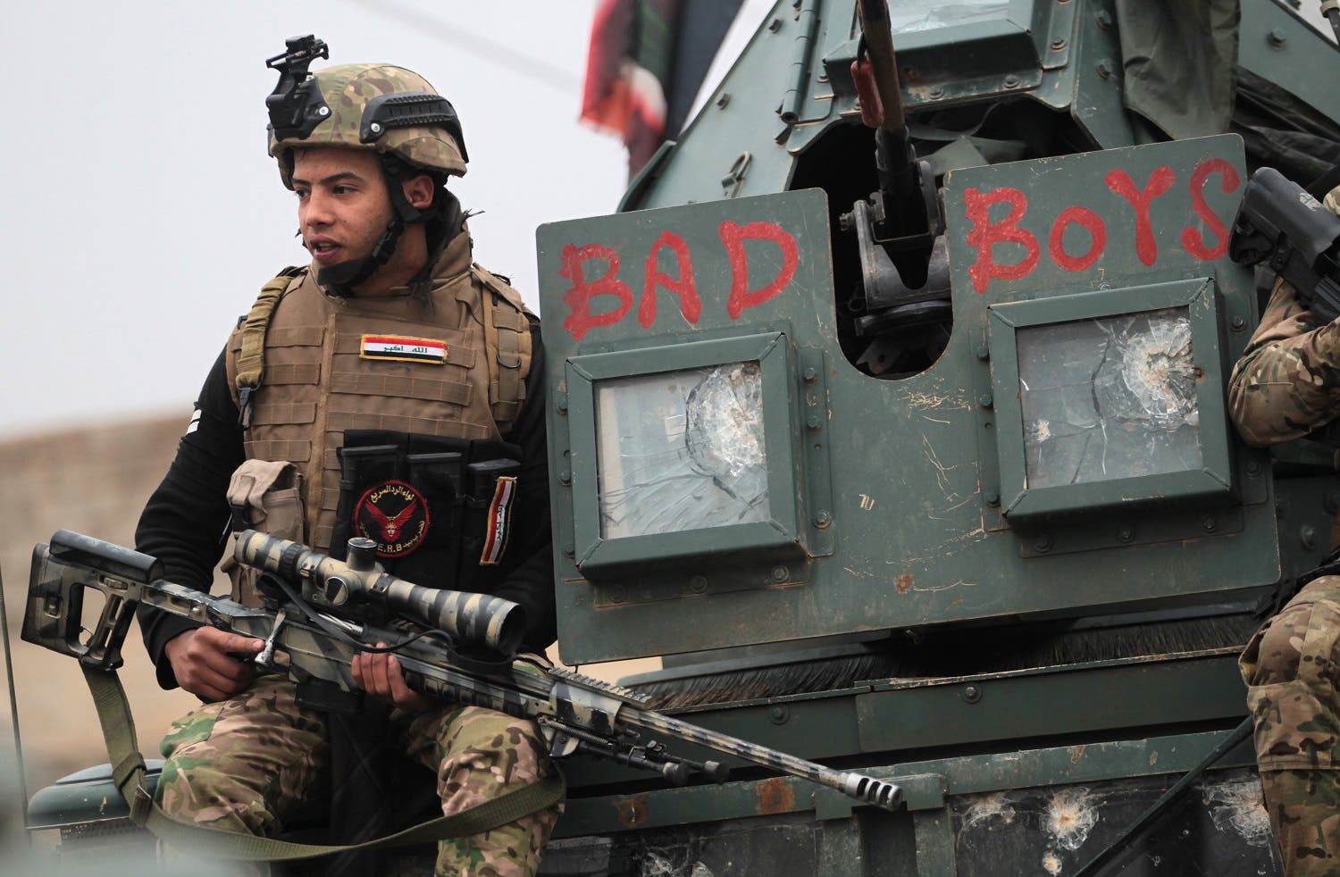 Iraqi pro-government forces patrol in the eastern part of the embattled Iraqi city of Mosul. (AFP)