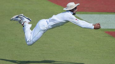 Pakistani cricketer Mohammad Amir takes a catch of West Indies' batsman Darren Bravo (unseen) on the second day of the third and final Test between Pakistan and West Indies at the Sharjah Cricket Stadium in Sharjah on October 31, 2016. (AFP)