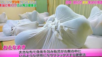 Find out why Japanese wrap themselves in cloth as a form of therapy