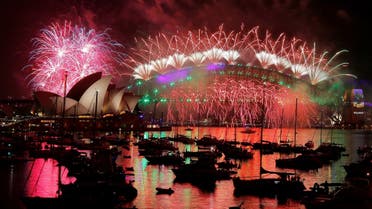 Fireworks explode over the Sydney Opera House and Harbour Bridge as Australia ushers in the New Year in Sydney. (Reuters)