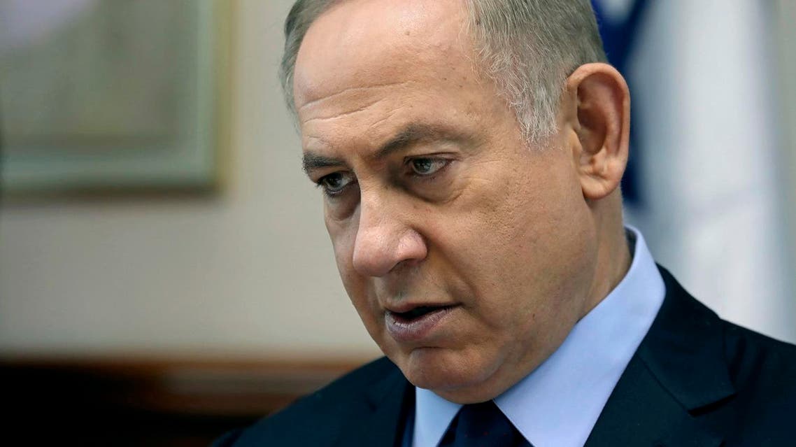 Israeli Prime Minister Benjamin Netanyahu chairs a weekly cabinet meeting, in Jerusalem, Sunday, Jan. 1, 2017. (Gali Tibbon/Pool photo via AP)