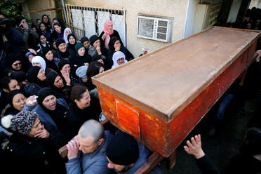The coffin of Israeli woman, Leanne Nasser, who was killed in an Istanbul nightclub attack, is carried out of the family house to be buried at the Israeli town of Tira, Israel January 3, 2017. REUTERS/Ronen Zvulun