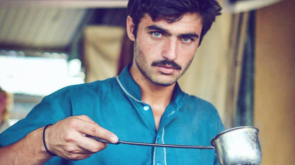 Arshad Khan, formerly a chai wala (tea seller) by profession, poses for a picture after doing a television interview in Islamabad, Pakistan October 20, 2016. A picture of Khan selling tea at the Islamabad Sunday market went viral on Twitter with the hashtag #ChaiWala after people in Pakistan and India commented on his piercing eye color. At first the attention interfered in his work, but he has since stopped working as a tea seller with offers of a modeling contract. REUTERS/Faisal Mahmood