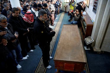 Relatives and friends pray next to the coffin of Israeli woman, Leanne Nasser, who was killed in an Istanbul nightclub attack, inside a mosque at the Israeli town of Tira, Israel January 3, 2017. REUTERS/Ronen Zvulun