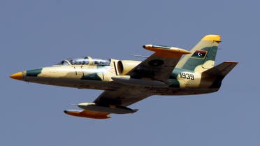 A Libyan fighter jet flies over the eastern city of Benghazi during a military parade to celebrate the second anniversary of NATO’s first military operation in Libya on March 19, 2013. (File photo: AFP)