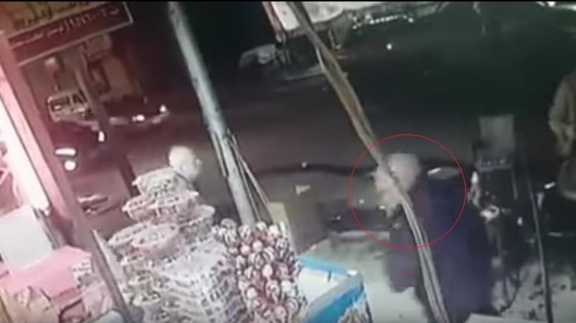 The suspect, who has been arrested, came up behind the victim and slashed his throat while he was sitting in front of his shop. (Screengrab)