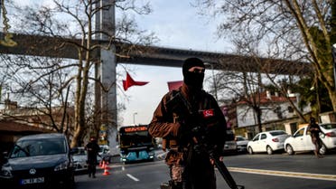 A Turkish special force police officer walks in front of the Reina nightclub on January 4, 2017 in Istanbul, three days after a gunman killed 39 people on New Year's night. (AFP)