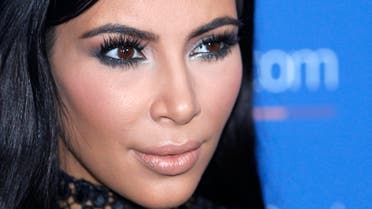 Kardashian also posted a home video of her family that will likely put to rest rumors of a divorce. (AP)