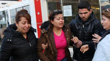 People react after an explosion outside a courthouse in Izmir. (Reuters)
