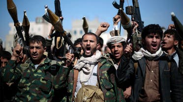 In this Thursday, Nov. 24, 2016 file photo, tribesmen loyal to Houthi rebels hold their weapons as they chant slogans during a gathering to mobilize more fighters into battlefronts in several Yemeni cities, in Sanaa, Yemen. AFP