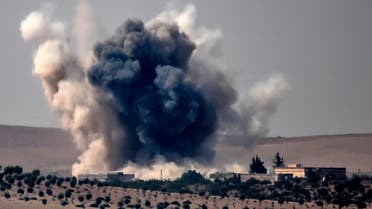 This picture taken from the Turkish Syrian border city of Karkamis in the southern region of Gaziantep, on August 24, 2016 shows smoke billows following air strikes by a Turkish Army jet fighter on the Syrian Turkish border village of Jarabulus during fighting against ISIS targets. (AFP)