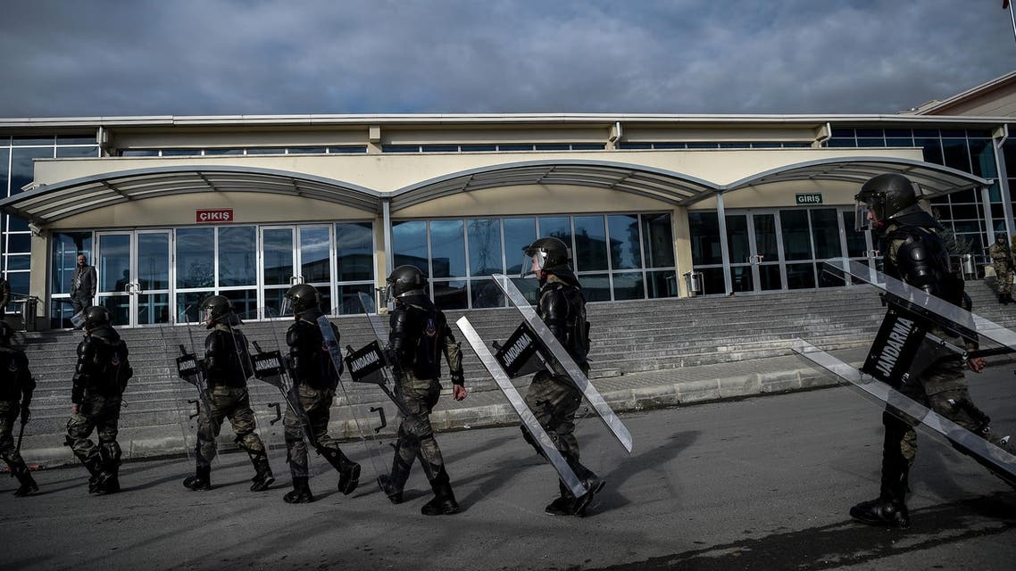 Turkish anti-riot forces walk next to the courthouse on December 27, 2016 at Silivri district in Istanbul. Almost 30 Turkish police went on trial in Istanbul on December 27, 2016 charged with involvement in the July 15 coup bid