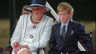 In this Aug. 19, 1995 file photo, Britain's Princess Diana, left, sits next to her younger son Prince Harry during V-J Day celebrations in London. (AP)