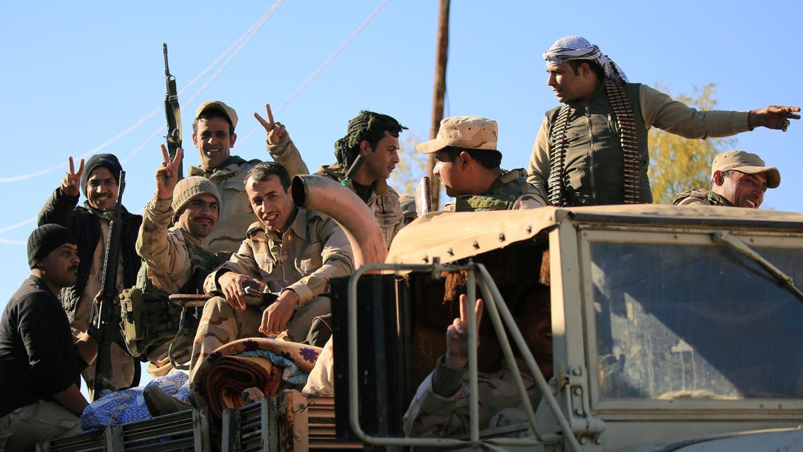 Iraqi army members ride in a military vehicle during a battle with Islamic State militants, in the village of Argoob, Iraq, January 6, 2017. REUTERS/Ari Jalal