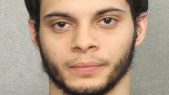 US shooter heard voices telling him to join ISIS