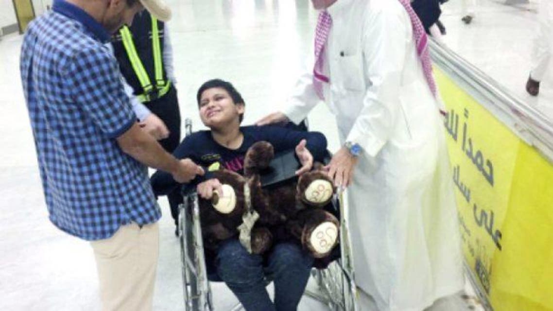Jawad Al-Malki is in tears as he looks for his father at King Abdul Aziz International Airport in Jeddah. (Photo courtesy: Okaz)