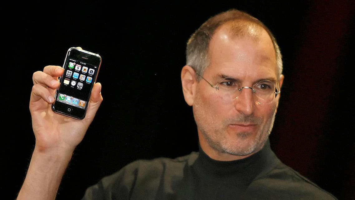 his file photo taken on January 9, 2007 at the Macworld Conference in San Francisco, California shows Apple chief executive Steve Jobs unveiling the iPhone. AFP