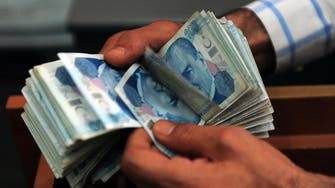 Turkish lira tumbles to fresh lows, central bank provides support