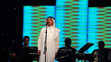 Saudi singer Mohammad Abdo gives a rare concert in the Red Sea port of Jeddah late on August 2, 2009. Saudi Arabia's most famous entertainer, who plays the oud, sings, and recites classical poetry in sold-out concerts around the Arab world, is taking part this year in Jeddah's summer festival at home. (AFP)