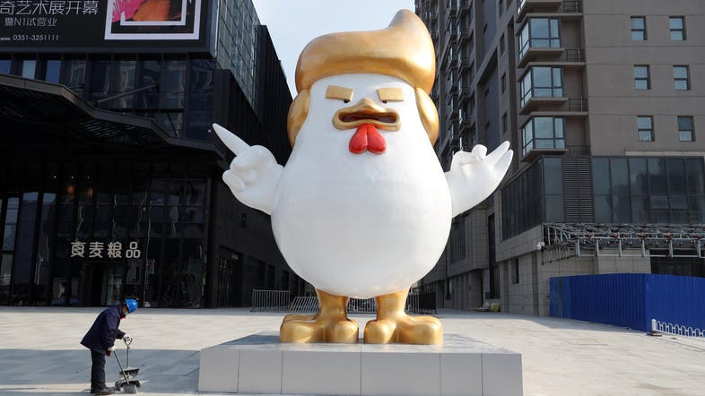 The Zhejiang, China-based factory has already produced 30 of the 'Trump rooster' inflatables, some of which are up to 20 meters (65.6 feet) in height (AFP photo)