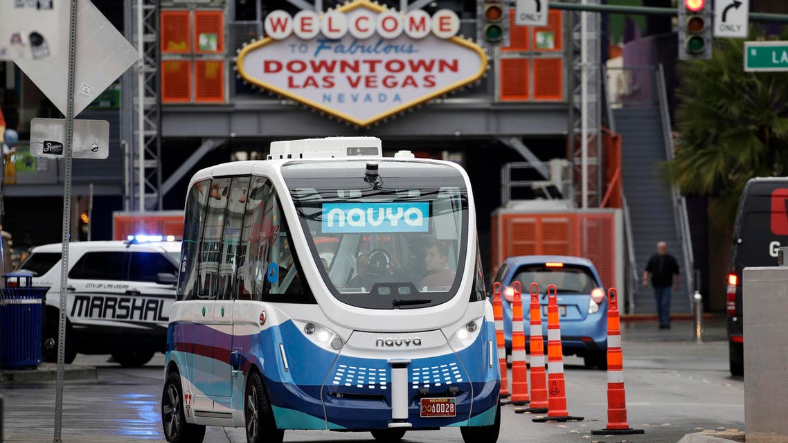 In this Jan. 12, 2017, photo, the Navya Arma autonomous vehicle drives down a street in Las Vegas. The driverless electric shuttle has begun carrying passengers in a test program in a downtown Las Vegas entertainment district. (AP)