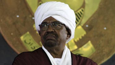 Sudanese President Omar al-Bashir (C) looks on during a celebration to mark the 61st anniversary of Sudan’s independence from Britain, at the presidential palace in Khartoum, on December 31, 2016. (AFP)