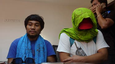 South Korean hostage Park Chul-hong, seated right, and Filipino hostage Glen Alindajao, left, prepare to answer questions after being flown in Davao from Jolo following their release Saturday, Jan. 14, 2017 from their kidnappers in the volatile island of Jolo in southern Philippines. (AP)