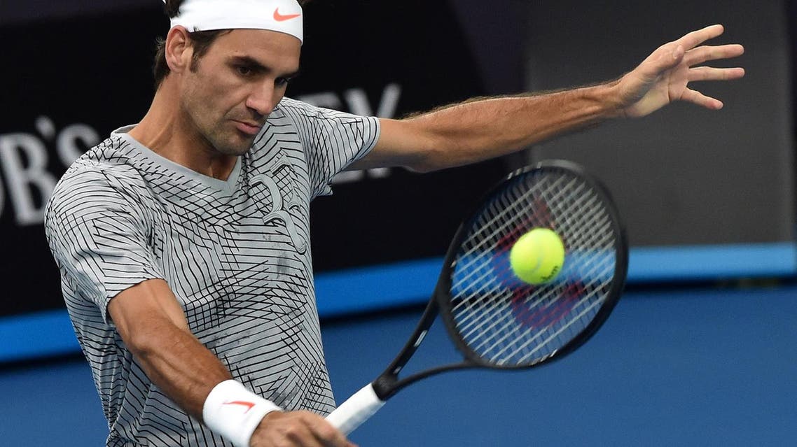 Roger Federer of Switzerland hits a return during a practice session ahead of the Australian Open tennis tournament in Melbourne on Jan. 15, 2017 (Photo: Paul Crock/AFP)