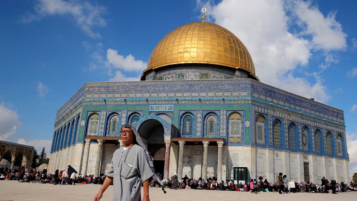 A man walks next to the Dome of the Rock on the compound known to Muslims as Noble Sanctuary and to Jews as Temple Mount during Friday prayers in Jerusalem's Old City, January 13, 2017. (Reuters)