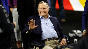Former President George H. W. Bush waves as he arrives at NRG Stadium before the NCAA Final Four tournament college basketball semifinal game between Villanova and Oklahoma Saturday, April 2, 2016, in Houston. (AP)