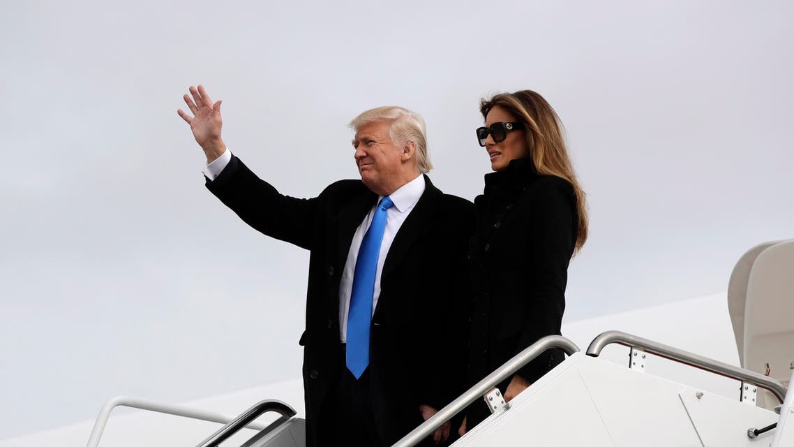President-elect Donald Trump, accompanied by his wife Melania, waves as they arrive at Andrews Air Force Base, Md., Thursday, Jan. 19, 2017, in advance of Friday's inauguration. (AP)
