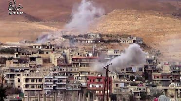 This file frame grab from video provided on Sunday, Dec. 25, 2016 by Step News Agency, a Syrian opposition media outlet that is consistent with independent AP reporting, shows smoke rise from the government forces shelling on Wadi Barada, northwest of Damascus, Syria. (AP)