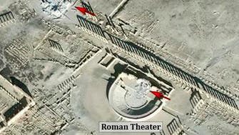 Photos: ISIS destroys part of Roman theater in Syrian town of Palmyra